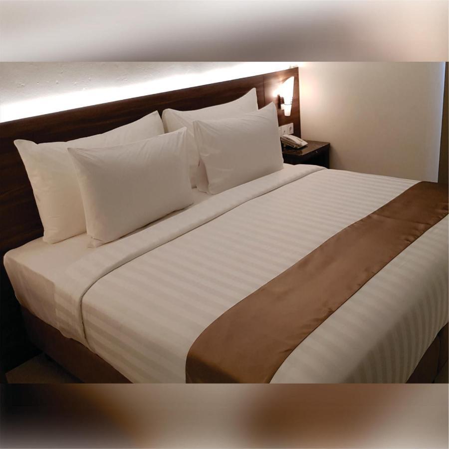 Aimas Hotel And Convention Centre Соронг Екстериор снимка